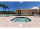 Relaxing community hot tub with access to the pool and lounge seating at 8300 Parkside Dr, Englewood, FL 34224