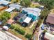 Aerial view of property with surrounding yard and boundary outlined in red, showcasing the lot size at 938 The Rialto, Venice, FL 34285