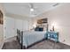 Comfortable bedroom featuring carpet, natural light, and a double door closet at 938 The Rialto, Venice, FL 34285