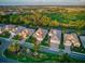 Aerial view of a well-planned residential area showcasing lush greenery, manicured lawns and pristine community streets at 27336 Driver Ln, Englewood, FL 34223