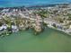 Stunning aerial view of waterfront homes and community with ocean access and serene bay waters at 101 Louella Ln # 11, Nokomis, FL 34275