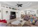 Spacious living room with high ceilings, fan, and an open floor plan at 11026 Barnsley Dr, Venice, FL 34293