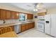 Functional kitchen with ample cabinet space, updated appliances, and a bright atmosphere at 11153 Deerwood Ave, Englewood, FL 34224