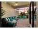 Relaxing screened patio with comfortable seating and a tranquil outdoor view at 115 Babbling Brook Run, Bradenton, FL 34212