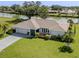 Charming single-story home with a well-manicured lawn and waterfront view at 1232 Pine Needle Rd, Venice, FL 34285