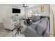 Cozy living room with comfortable seating and a modern lamp at 1232 Pine Needle Rd, Venice, FL 34285