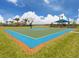 Outdoor basketball court on a sunny day, perfect for sports and recreation in a beautiful community setting at 13166 Huerta St, Venice, FL 34293