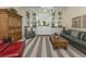A beautifully decorated living room with recessed lighting, built-in shelves, and elegant furniture at 13166 Huerta St, Venice, FL 34293