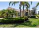 Inviting single-Gathering home with lush landscaping, a well-manicured lawn, and a charming entrance at 13415 Coluccio St, Venice, FL 34293