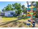 Wide shot of backyard and garden at 140 Avenida De La Isla, Nokomis, FL 34275