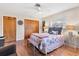 Spacious bedroom showcasing natural light, wood floors, and closet at 140 Avenida De La Isla, Nokomis, FL 34275
