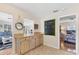 Open kitchen looking into the living area and bedroom, with modern appliances at 140 Avenida De La Isla, Nokomis, FL 34275