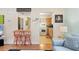 Open-concept living space with breakfast bar and a view into the adjacent kitchen at 140 Avenida De La Isla, Nokomis, FL 34275