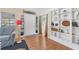 Bright living room with hardwood floors, built-in shelving and an inviting ambiance at 140 Avenida De La Isla, Nokomis, FL 34275