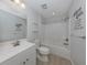 Bathroom features tub/shower combo, and white vanity with stone countertop at 15232 Faulkner Ave, Port Charlotte, FL 33953