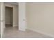 Bright bedroom features tile flooring and neutral walls at 1565 Hyssop Loop, North Port, FL 34289