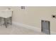 Laundry room features a utility sink at 1565 Hyssop Loop, North Port, FL 34289