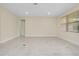 Bright living area with recessed lighting, and large window with blinds at 1565 Hyssop Loop, North Port, FL 34289
