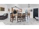 Spacious kitchen featuring a breakfast bar, modern appliances, and ample counter space for cooking and entertaining at 1609 Kirkwood St, North Port, FL 34288