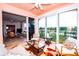 Relaxing balcony with comfortable seating, offering serene views of the surrounding landscape and interior living area at 1711 Gondola Park Dr # 1711, Venice, FL 34292