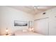 Bright bedroom featuring a ceiling fan, a neutral color palette, and closet at 1711 Gondola Park Dr # 1711, Venice, FL 34292