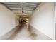 Open garage with plenty of room for parking and storage at 1711 Gondola Park Dr # 1711, Venice, FL 34292