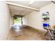 Spacious garage with ample storage space, featuring an open door to the outside at 1711 Gondola Park Dr # 1711, Venice, FL 34292