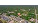 Desirable residential neighborhood featuring well-maintained homes with tree-lined streets and lush greenery at 172 Berthoud St, Port Charlotte, FL 33953