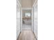 Bright bathroom with a soaking tub and decorative tile flooring at 172 Berthoud St, Port Charlotte, FL 33953