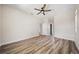 Spacious bedroom with wood floors, base trim, and ample natural light at 172 Berthoud St, Port Charlotte, FL 33953