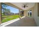 Screened in patio with expansive view of the yard and neighborhood at 172 Berthoud St, Port Charlotte, FL 33953