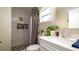 Beautiful bathroom featuring a marble tiled shower at 1727 E Manasota Beach Rd, Englewood, FL 34223