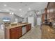 Spacious kitchen with an island and granite counters flows seamlessly into the living area at 194 Sportsman Rd, Rotonda West, FL 33947