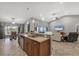 Open kitchen featuring granite countertops, wood cabinetry, and stainless steel appliances at 194 Sportsman Rd, Rotonda West, FL 33947