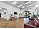 Inviting lobby area featuring tiled floors, comfortable seating, and a brightly lit, open space at 194 Sportsman Rd, Rotonda West, FL 33947