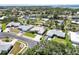 Overview of a peaceful neighborhood showcasing single-Gathering homes with landscaped yards in a tranquil setting at 201 Bayside Ct, Nokomis, FL 34275