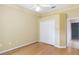 Bedroom featuring hardwood floors, neutral walls, double closets and a ceiling fan at 201 Bayside Ct, Nokomis, FL 34275