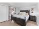 Bedroom featuring a decorative wood bed frame and a closet at 203 Palm Ave, Nokomis, FL 34275