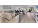 A gorgeous open concept living and kitchen space complete with stylish furnishings and modern appliances at 203 Palm Ave, Nokomis, FL 34275
