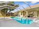 Inviting private pool with a screened enclosure and ample deck space for lounging and entertainment at 2187 Calusa Lakes Blvd, Nokomis, FL 34275