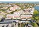 Expansive aerial view of a condo community with covered parking and water views at 230 Santa Maria St # 333, Venice, FL 34285