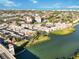 A high-angle aerial view of a condominium community near the water at 230 Santa Maria St # 333, Venice, FL 34285