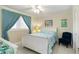 Cozy bedroom with natural light, calm color palette, and modern ceiling fan at 230 Santa Maria St # 333, Venice, FL 34285