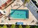 Aerial view of a community pool offering a place to relax and enjoy the outdoors at 230 Santa Maria St # 333, Venice, FL 34285
