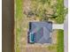 Aerial view showcasing the pool, screened in patio, and proximity to the waterfront at 233 Rotonda Cir, Rotonda West, FL 33947