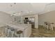 Bright kitchen featuring stainless steel appliances, a marble island, and eat-in dining at 233 Rotonda Cir, Rotonda West, FL 33947