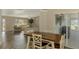 Open-concept kitchen, living, and dining area, great for entertaining at 233 Rotonda Cir, Rotonda West, FL 33947