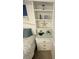 Bedroom featuring a nightstand with storage and a built in shelf for decor at 235 Trailorama Dr, North Port, FL 34287
