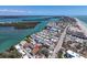 An aerial view shows this beachfront property situated close to the bay and ocean at 2405 N Beach Rd # 4, Englewood, FL 34223