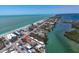 Scenic aerial view showcasing beachfront condo with a shared pool and coastal charm at 2405 N Beach Rd # 4, Englewood, FL 34223